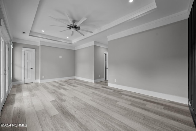 505 N Shore Dr, Sneads Ferry, NC 28460 - empty room featuring a tray ceiling, recessed lighting, a ceiling fan, light wood finished floors, and ornamental molding