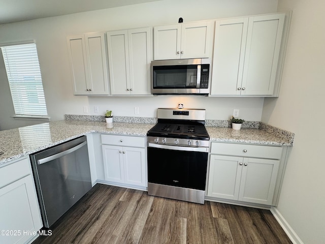 18 Landward Way, Wilmington, NC 28411 - kitchen with appliances with stainless steel finishes, dark wood finished floors, and light stone countertops