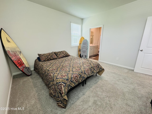 18 Landward Way, Wilmington, NC 28411 - carpeted bedroom with baseboards and connected bathroom