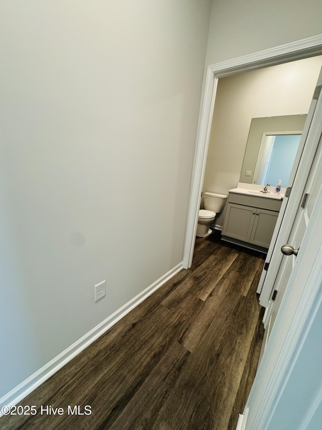 18 Landward Way, Wilmington, NC 28411 - bathroom featuring toilet, vanity, wood finished floors, and baseboards