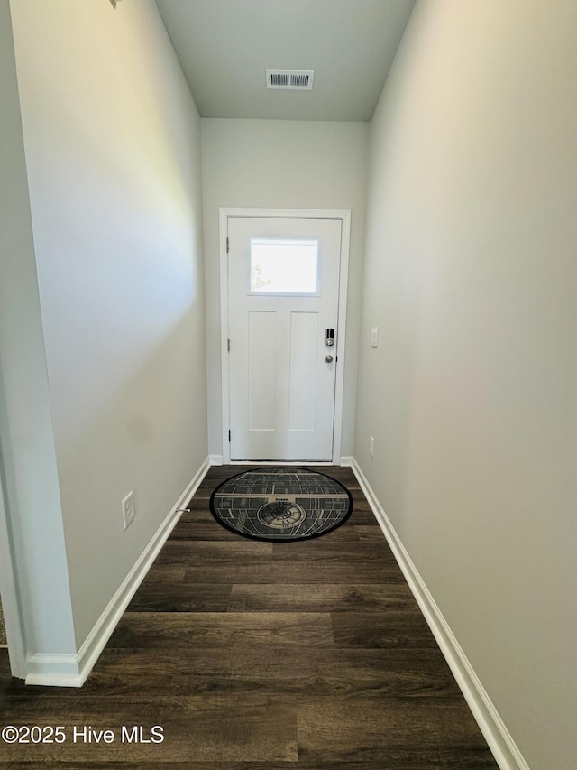 18 Landward Way, Wilmington, NC 28411 - doorway with dark wood-type flooring and baseboards