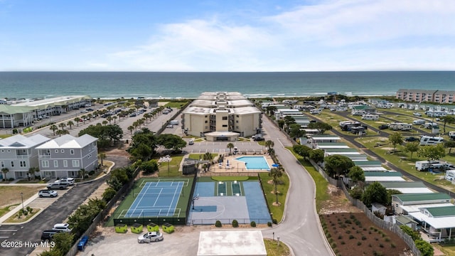 9100 Reed Dr Unit 3107, Emerald Isle, NC 28594 - drone / aerial view of a nearby body of water and a pool area