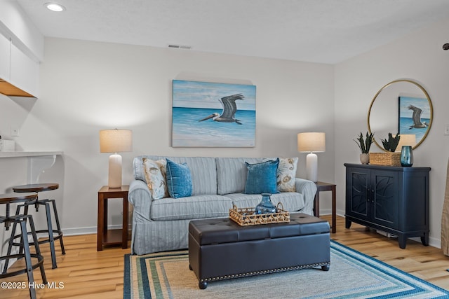 9100 Reed Dr Unit 3107, Emerald Isle, NC 28594 - living room with wood finished floors, recessed lighting, and baseboards