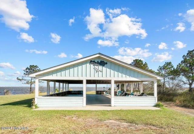 100 Mercedes Ct Unit F, Grandy, NC 27939 - dock area with a lawn