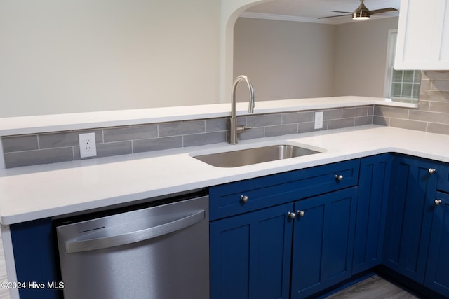 212 Tram Rd, West End, NC 27376 - kitchen featuring stainless steel dishwasher, blue cabinets, a sink, crown molding, and backsplash