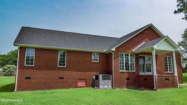 103 Loblolly Dr, Plymouth, NC 27962 - back of property featuring crawl space, a yard, brick siding, and roof with shingles