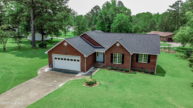 103 Loblolly Dr, Plymouth, NC 27962 - ranch-style house featuring brick siding, an attached garage, concrete driveway, a front lawn, and roof with shingles