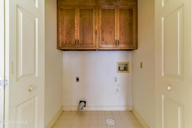 103 Loblolly Dr, Plymouth, NC 27962 - laundry room featuring hookup for an electric dryer, washer hookup, cabinet space, baseboards, and light tile patterned flooring