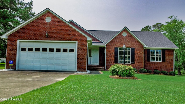 103 Loblolly Dr, Plymouth, NC 27962 - view of front of property with concrete driveway, brick siding, a front yard, a shingled roof, and an attached garage