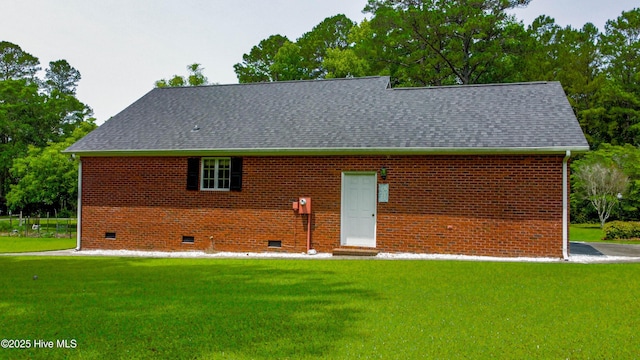 103 Loblolly Dr, Plymouth, NC 27962 - rear view of house with crawl space, a yard, a shingled roof, and brick siding