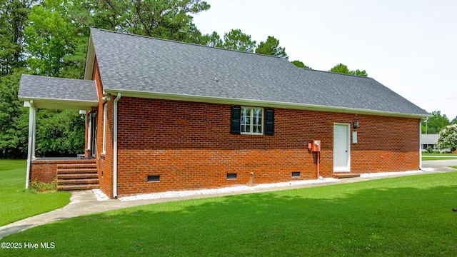 103 Loblolly Dr, Plymouth, NC 27962 - view of front of house featuring crawl space, a front lawn, roof with shingles, and brick siding