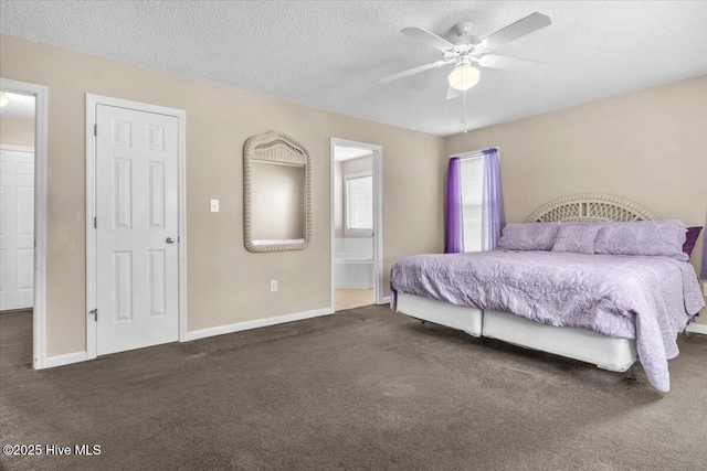 734 Sloop Pointe Ln, Kure Beach, NC 28449 - bedroom featuring carpet flooring, a textured ceiling, baseboards, ensuite bath, and a ceiling fan