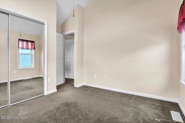 734 Sloop Pointe Ln, Kure Beach, NC 28449 - unfurnished bedroom featuring carpet, baseboards, and vaulted ceiling