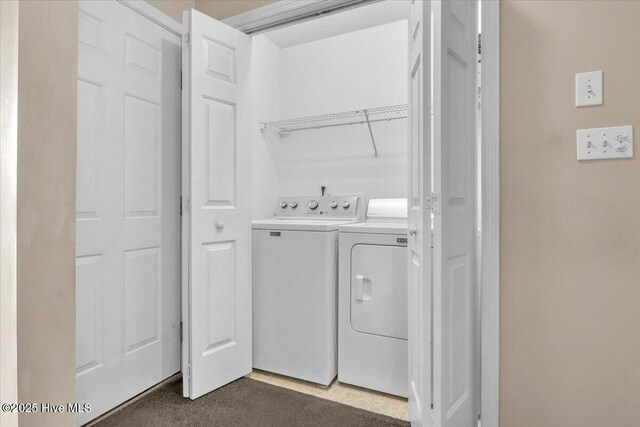 734 Sloop Pointe Ln, Kure Beach, NC 28449 - laundry room with washer and clothes dryer and dark carpet