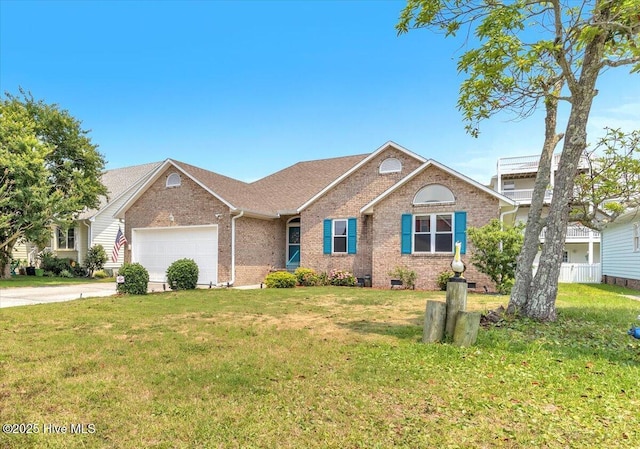 734 Sloop Pointe Ln, Kure Beach, NC 28449 - view of front of home with brick siding, a garage, concrete driveway, and roof with shingles