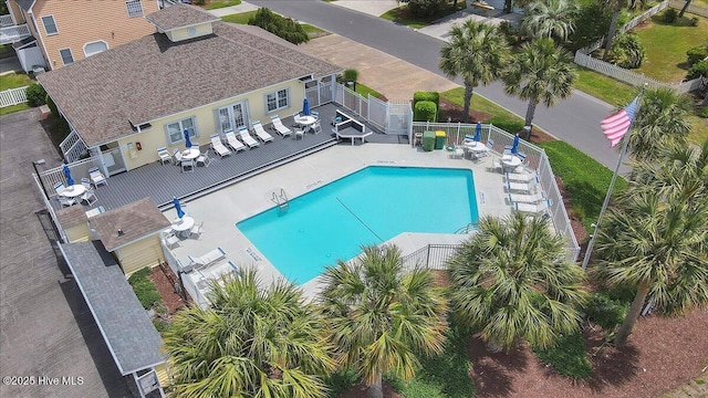 734 Sloop Pointe Ln, Kure Beach, NC 28449 - community pool featuring a fenced backyard and a patio