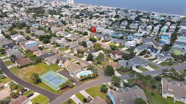734 Sloop Pointe Ln, Kure Beach, NC 28449 - aerial view of property's location featuring a large body of water and nearby suburban area