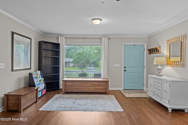 114 Mohican Trl, Wilmington, NC 28409 - entryway with ornamental molding, dark wood finished floors, and baseboards