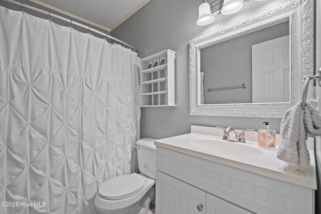 114 Mohican Trl, Wilmington, NC 28409 - bathroom with vanity, crown molding, toilet, and a shower with curtain
