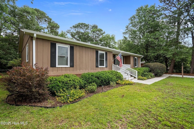 114 Mohican Trl, Wilmington, NC 28409 - ranch-style home featuring a front yard