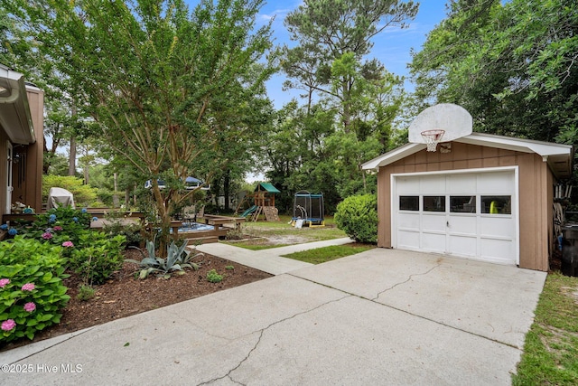 114 Mohican Trl, Wilmington, NC 28409 - detached garage featuring driveway