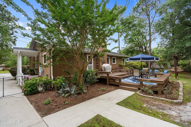 114 Mohican Trl, Wilmington, NC 28409 - view of yard with a wooden deck