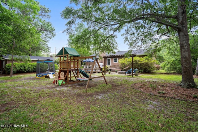 114 Mohican Trl, Wilmington, NC 28409 - view of playground featuring a trampoline