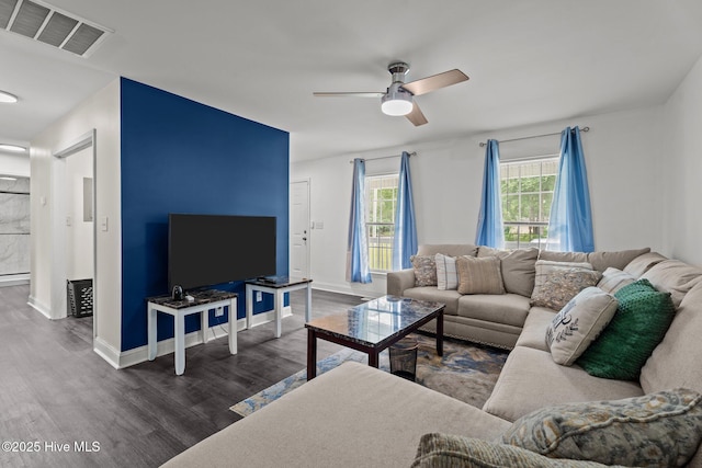 120 Ruby Rd, Goldsboro, NC 27534 - living room with wood finished floors, a ceiling fan, and baseboards