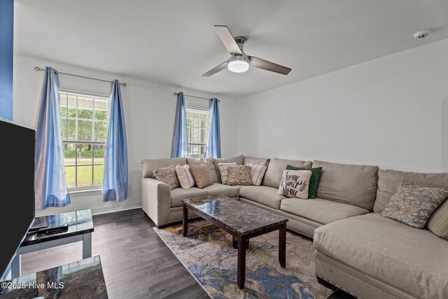 120 Ruby Rd, Goldsboro, NC 27534 - living room with healthy amount of natural light, wood finished floors, ceiling fan, and baseboards
