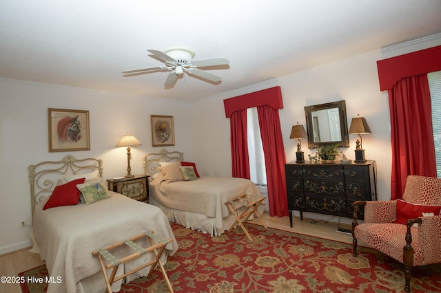 190 Palmetto Rd Unit 20, Pinehurst, NC 28374 - bedroom featuring crown molding, wood finished floors, and a ceiling fan