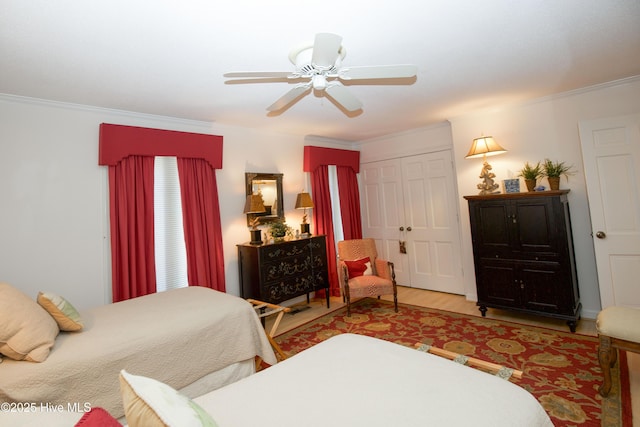 190 Palmetto Rd Unit 20, Pinehurst, NC 28374 - bedroom with ornamental molding, ceiling fan, and wood finished floors