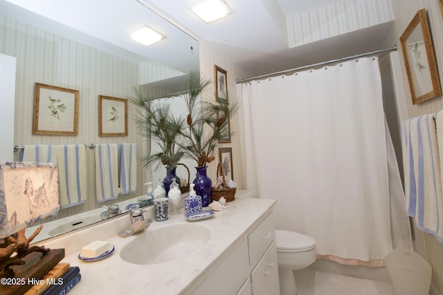190 Palmetto Rd Unit 20, Pinehurst, NC 28374 - full bath featuring wallpapered walls, toilet, vanity, tile patterned floors, and a shower with shower curtain