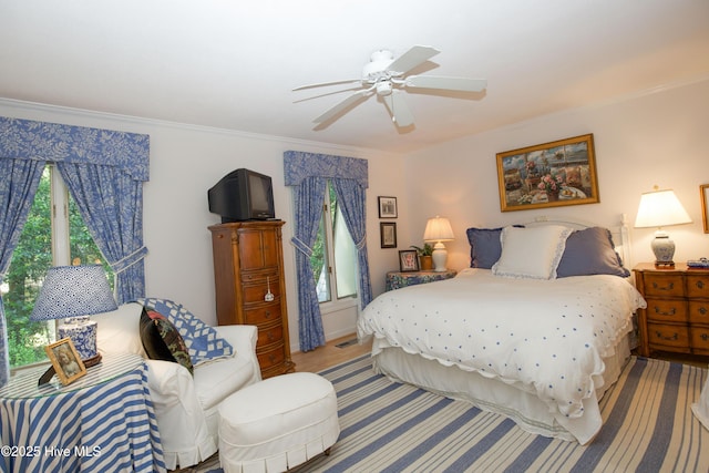190 Palmetto Rd Unit 20, Pinehurst, NC 28374 - bedroom featuring ornamental molding and ceiling fan