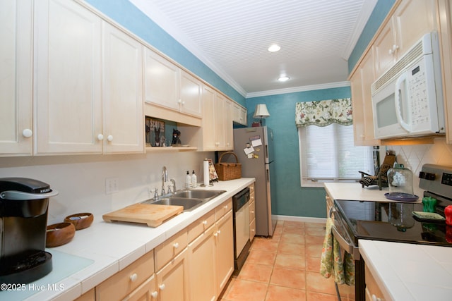 190 Palmetto Rd Unit 20, Pinehurst, NC 28374 - kitchen with white microwave, stainless steel electric stove, a sink, dishwasher, and tile counters