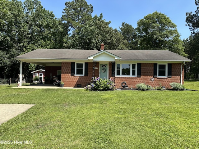 127 Deans Ln, Goldsboro, NC 27530 - single story home featuring brick siding, an attached carport, a front yard, and roof with shingles