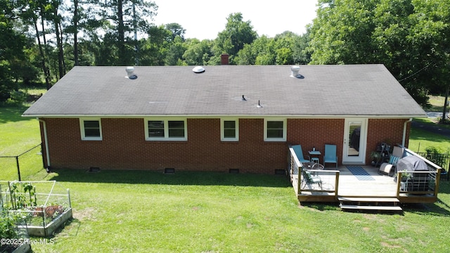 127 Deans Ln, Goldsboro, NC 27530 - back of property featuring a wooden deck, brick siding, crawl space, and a garden