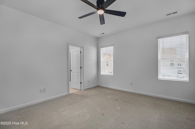 1617 Stanley St, Wilmington, NC 28401 - spare room with ceiling fan, light carpet, and baseboards