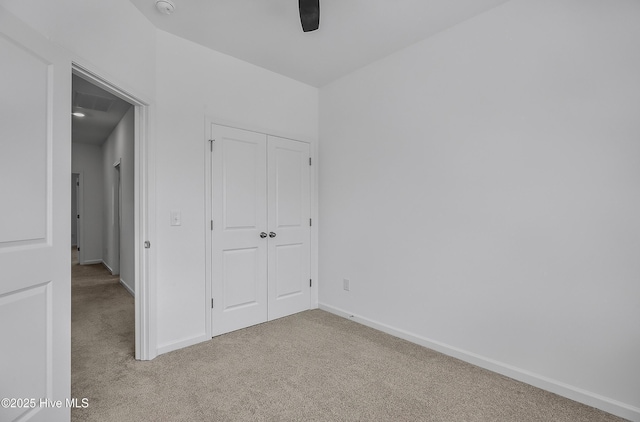 1617 Stanley St, Wilmington, NC 28401 - unfurnished bedroom featuring carpet flooring, a closet, baseboards, and a ceiling fan