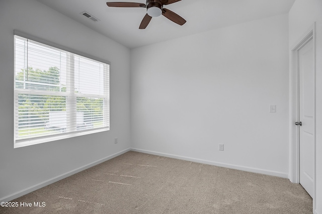 1617 Stanley St, Wilmington, NC 28401 - carpeted spare room featuring a ceiling fan and baseboards