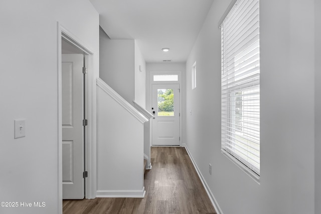 1617 Stanley St, Wilmington, NC 28401 - hall featuring dark wood finished floors, baseboards, and stairs