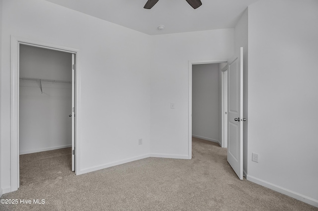 1617 Stanley St, Wilmington, NC 28401 - unfurnished bedroom with carpet floors, a walk in closet, a closet, and baseboards