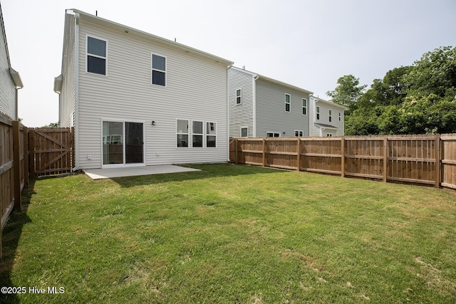 1617 Stanley St, Wilmington, NC 28401 - rear view of house with a patio area