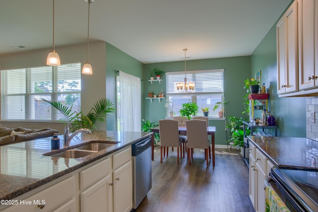 402 Saxby Way, Holly Ridge, NC 28445 - kitchen with stainless steel dishwasher, a sink, dark wood-type flooring, a chandelier, and white cabinets