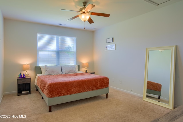 402 Saxby Way, Holly Ridge, NC 28445 - bedroom with light carpet, baseboards, and a ceiling fan