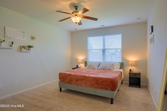 402 Saxby Way, Holly Ridge, NC 28445 - bedroom with light carpet, ceiling fan, and baseboards