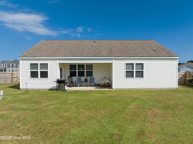 402 Saxby Way, Holly Ridge, NC 28445 - back of house with a patio and roof with shingles