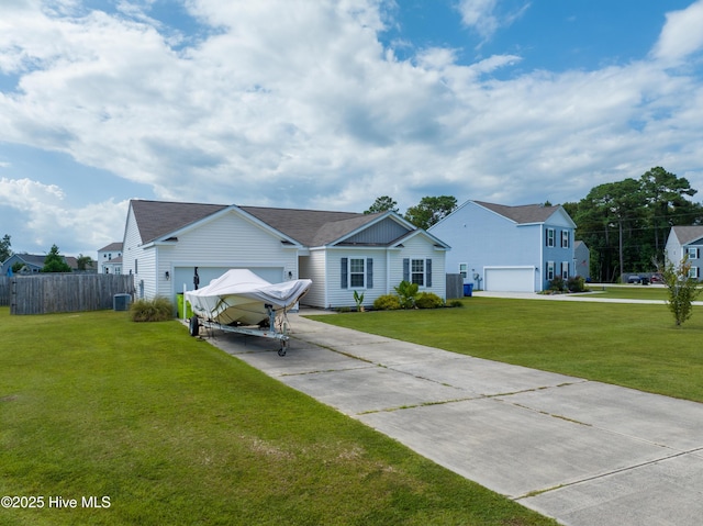 402 Saxby Way, Holly Ridge, NC 28445 - view of front of house with concrete driveway, central AC, and a garage