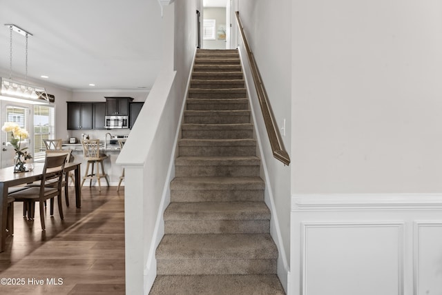 97 Violetear Rdg, Hampstead, NC 28443 - stairway with wood finished floors, ornamental molding, recessed lighting, and baseboards