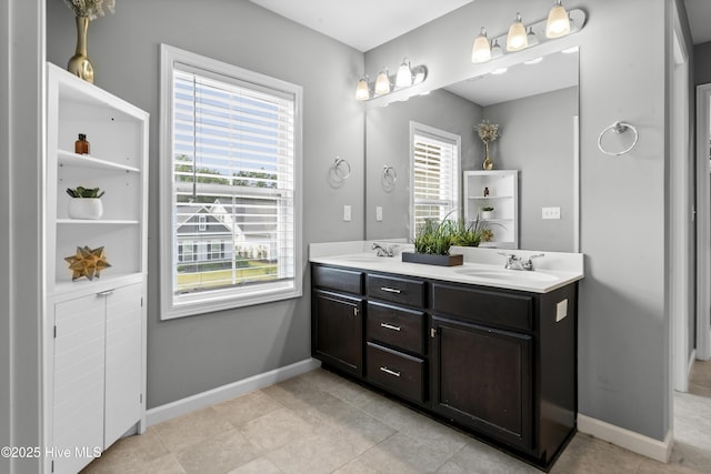 97 Violetear Rdg, Hampstead, NC 28443 - bathroom with double vanity, baseboards, and tile patterned floors