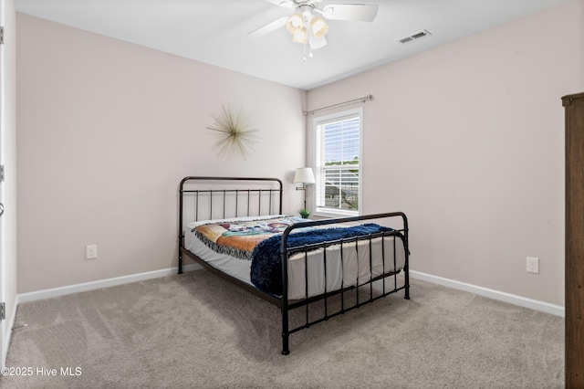 97 Violetear Rdg, Hampstead, NC 28443 - carpeted bedroom with baseboards and ceiling fan